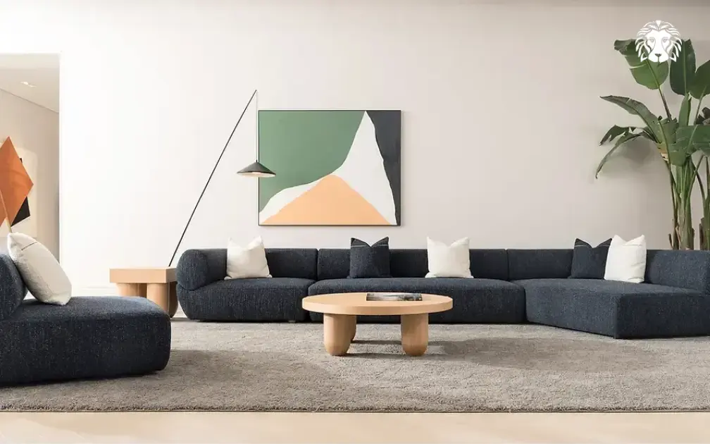 Bàn trà oval bo cong mềm mại, vừa giữ trọn chiều dài tiện ích vừa tối ưu lối đi thông thoáng. 