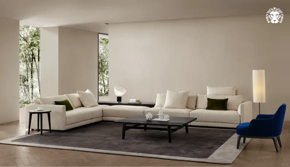 Bàn trà gỗ công nghiệp hình vuông lấp đầy khoảng trống trung tâm của sofa góc chữ L, tạo điểm tụ cân đối cho toàn bộ khu vực tiếp khách.